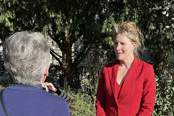 Viv Poskitt talking to a local resident 